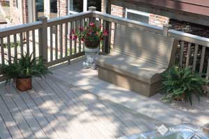 Pale gray composite boards with highlighted grain and built in bench seat